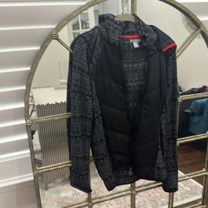 Excellent used condition medium SKYR brand puffer with sweater sleeves